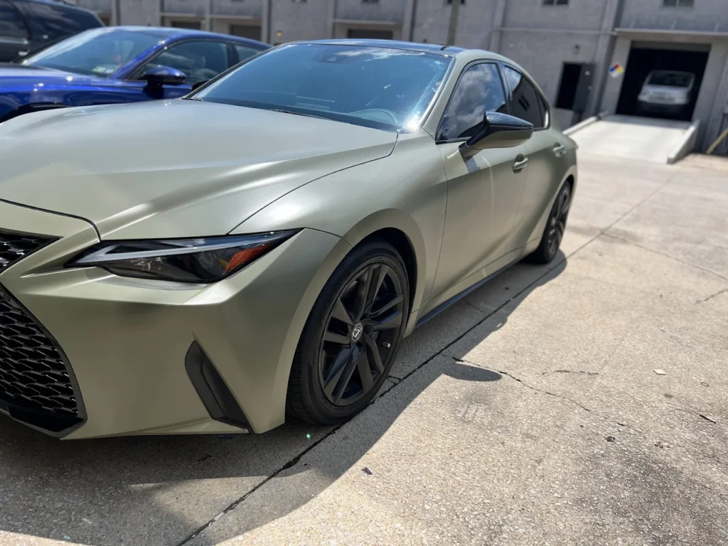 Side view of a grey car with full vinyl wrap by WrapItUp365